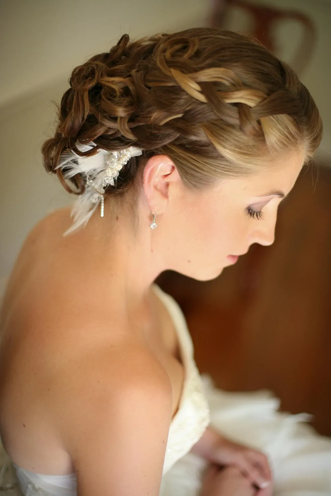 Wedding hair Hunter Valley, a curled updo finished with a fresh flower